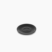 Load image into Gallery viewer, birds eye view of the black saucer for the mug on a white background
