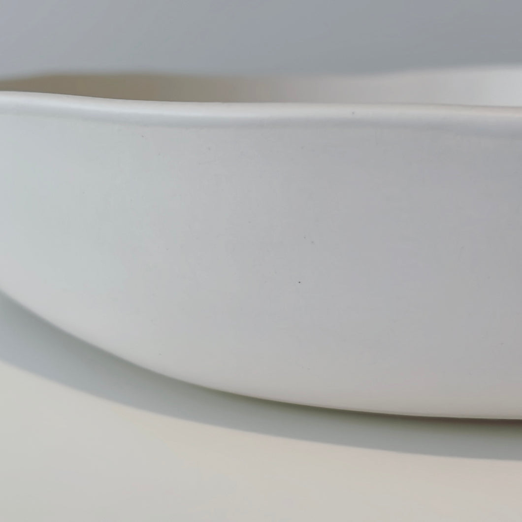 Close up of the large white Alex Marhsall bowl